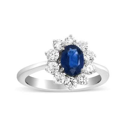 18K White Gold 7x5 mm Oval Cut Blue Sapphire and Round Diamond 3/4 Cttw Sunburst Halo Ring (F-G Color, VS1-VS2 Clarity)