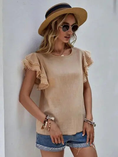 Blusa con mangas cortas y volantes Denise