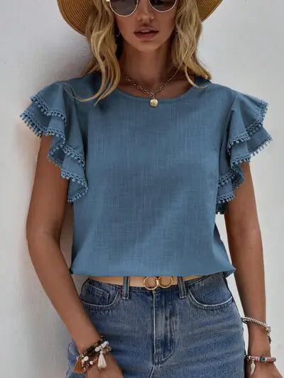 Blusa con mangas cortas y volantes Denise