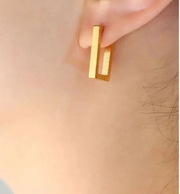 Pendientes geométricos de oro Terra