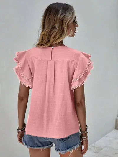 Blusa con mangas cortas y volantes Denise