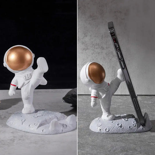 Soporte para teléfono con forma de astronauta