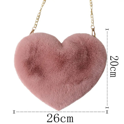 Heart Shaped Faux Fur Crossbody Wallet Crafted from high-quality faux fur, this wallet is soft to the touch and luxurious to look at.