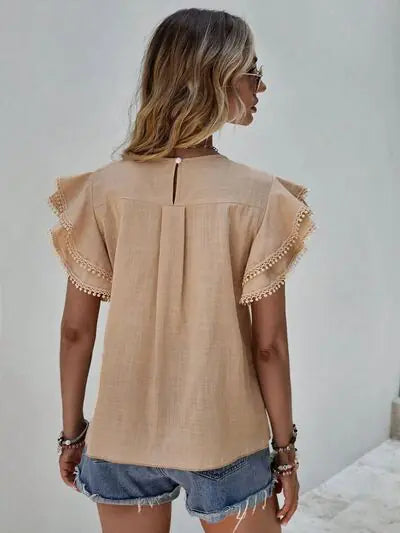 Blusa con mangas cortas y volantes Denise