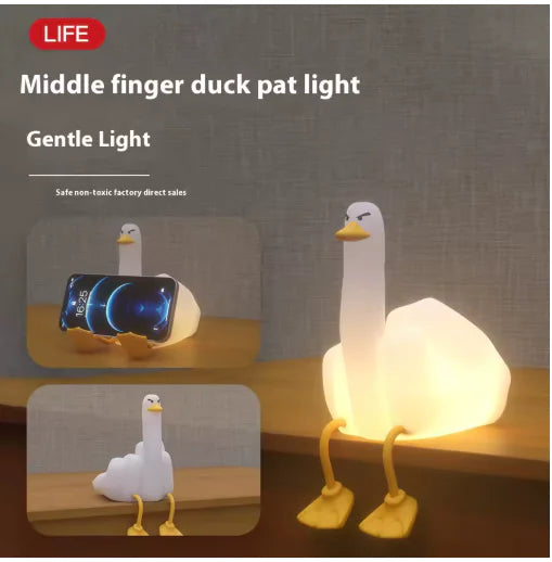 Luz nocturna recargable con forma de pato dedo medio