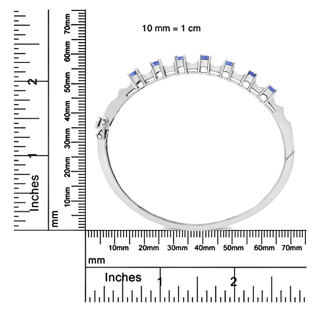 Brazalete de oro blanco de 14 quilates con tanzanita azul ovalada de 5 mm y diamantes de 1/4 quilates (color HI, claridad VS2-SI1). Se adapta a muñecas de hasta 7 1/2 pulgadas.