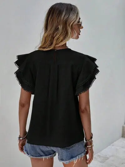 Blusa con mangas cortas y volantes Denise