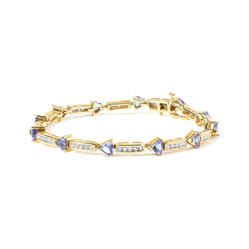 14K gul 5MM trillionskuttet blå tanzanitt og 1 1/10 Cttw Diamond Tennis 7" armbånd (HI Color, I1-I2 Clarity)