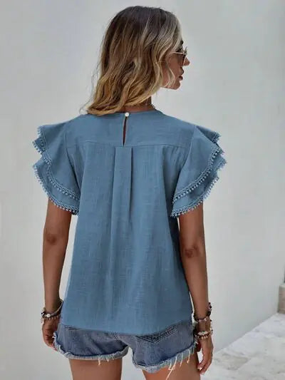 Blusa con mangas cortas y volantes Denise